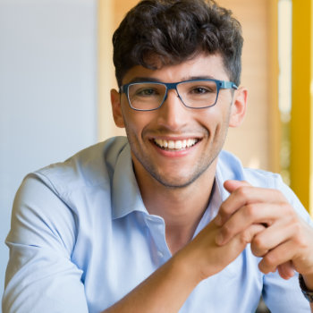 Closeup shot of young man wearing glasses