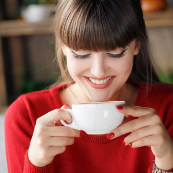 Girl with a Cup of hot tea