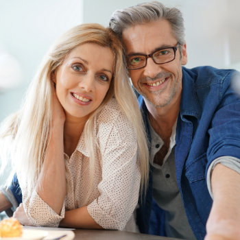 Portrait of happy middle aged couple