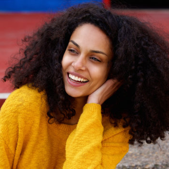 laughing african american woman with beautiful smile