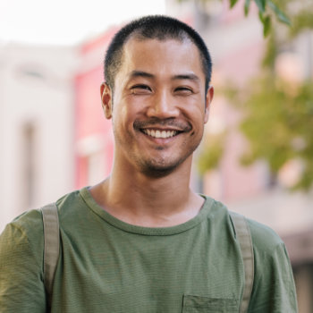mature asian man with sunny smile