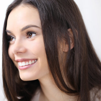 young smiling long haired brunette