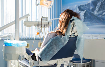woman in dental chair during sedation
